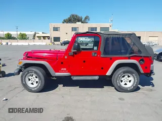 2005 Jeep Wrangler Unlimited with VIN 1J4FA44S65P324248, listed as a IAAI auction lot 42235190 with 86,971 mi miles and . Bid and sale history available at DreamBid. Image 14.