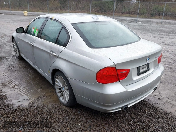 2011 BMW 3 Series 335i with VIN WBAPM5C58BE576736, listed as a IAAI auction lot 41859606 with 120,884 mi miles. Bid and sale history available at carsss.com. Image 3.