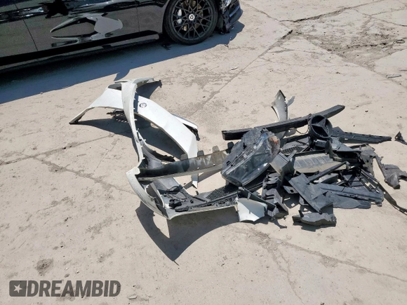 2014 Mercedes-Benz CLA 250 with VIN WDDSJ4EB8EN040382, listed as a Copart auction lot 61055185 with 76,380 mi miles and Salvage title. Bid and sale history available at DreamBid. Image 12.