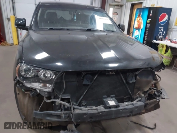 2013 Dodge Durango R/T z VIN 1C4SDJCT4DC670406, wystawiony jako IAAI lot #41685272 z przebiegiem 230 767 mil mil oraz . Historia ofert i sprzedaży dostępna na DreamBid. Obrazek 12.