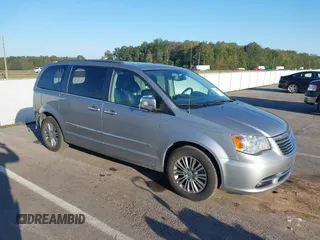 2015 Chrysler Town & Country Touring-L with VIN 2C4RC1CG9FR507121, listed as a IAAI auction lot 40517562 with 149,974 mi miles. Bid and sale history available at carsss.com. Image 1.