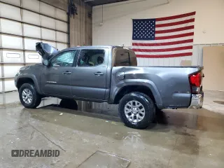 2018 Toyota Tacoma SR with VIN 3TMCZ5AN2JM173818, listed as a Copart auction lot 46692285 with Not Provided miles and Salvage Title. Bid and sale history available at DreamBid. Image 2.