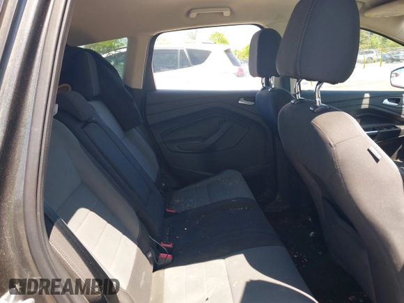 2016 Ford Escape SE z VIN 1FMCU9GX1GUB92472, wystawiony jako IAAI lot #42133744 z przebiegiem 184 000 mil mil oraz . Historia ofert i sprzedaży dostępna na DreamBid. Obrazek 8.