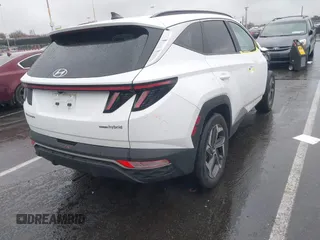 2022 Hyundai Tucson SEL Convenience with VIN KM8JFCA19NU017550, listed as a IAAI auction lot 42021829 with 36,450 mi miles and . Bid and sale history available at carsss.com. Image 4.