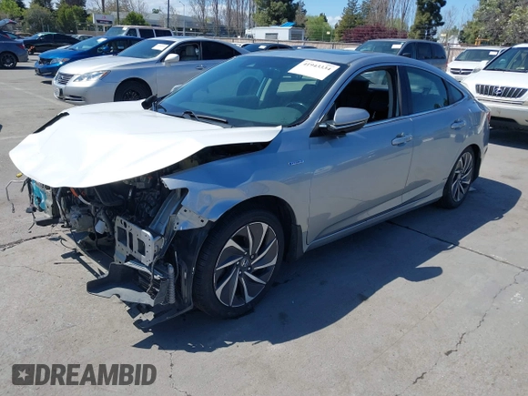2019 Honda Insight Touring with VIN 19XZE4F93KE007489, listed as a IAAI auction lot 41943334 with 118,689 mi miles and . Bid and sale history available at DreamBid. Image 18.