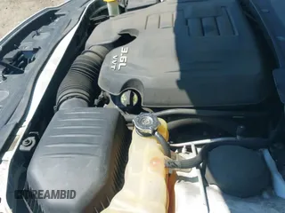 2013 Chrysler 300 with VIN 2C3CCAAG9DH504011, listed as a IAAI auction lot 43243250 with 50,174 mi miles and . Bid and sale history available at DreamBid. Image 12.