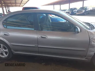 2003 Nissan Maxima SE z VIN JN1DA31D43T512898, wystawiony jako IAAI lot #42111179 z przebiegiem 210 817 mil mil oraz . Historia ofert i sprzedaży dostępna na DreamBid. Obrazek 13.