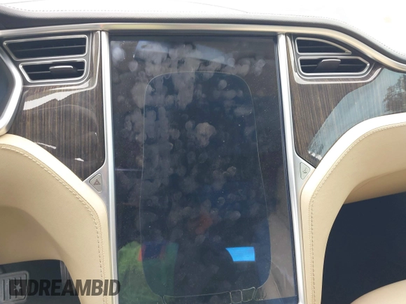 2013 Tesla Model S with VIN 5YJSA1CN8DFP21869, listed as a IAAI auction lot 41772603 with Not provided miles and . Bid and sale history available at DreamBid. Image 14.