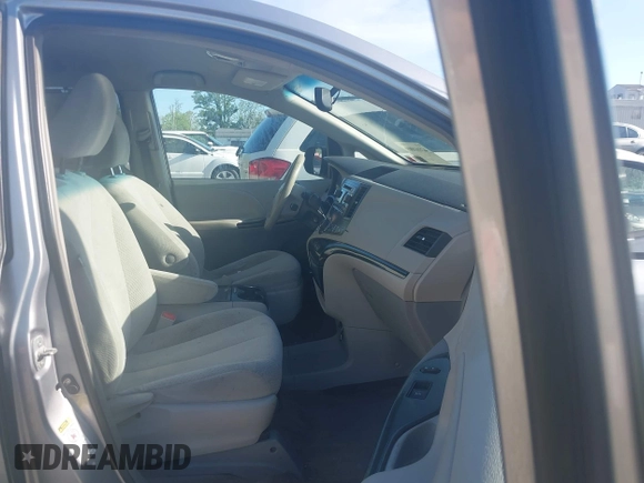 2013 Toyota Sienna LE AAS with VIN 5TDKK3DCXDS369976, listed as a IAAI auction lot 42161009 with 183,408 mi miles. Bid and sale history available at carsss.com. Image 5.