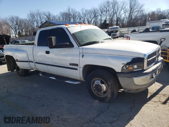 1999 Dodge 3500 with VIN 1B7MC3362XJ571424, listed as a Copart auction lot 42215965 with 248,410 mi miles and Clean title. Bid and sale history available at DreamBid. Image 4.