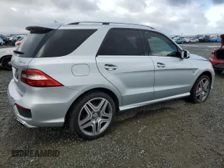 2015 Mercedes-Benz M 63 AMG with VIN 4JGDA7EB7FA504173, listed as a Copart auction lot 47596605 with 114,001 mi miles and Salvage Title. Bid and sale history available at carsss.com. Image 3.