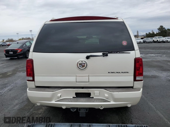 2003 Cadillac Escalade z VIN 1GYEC63T93R208877, wystawiony jako Copart lot #83894424 z przebiegiem 160 530 mil mil oraz Szkoda całkowita • Salvage title. Historia ofert i sprzedaży dostępna na DreamBid. Obrazek 6.