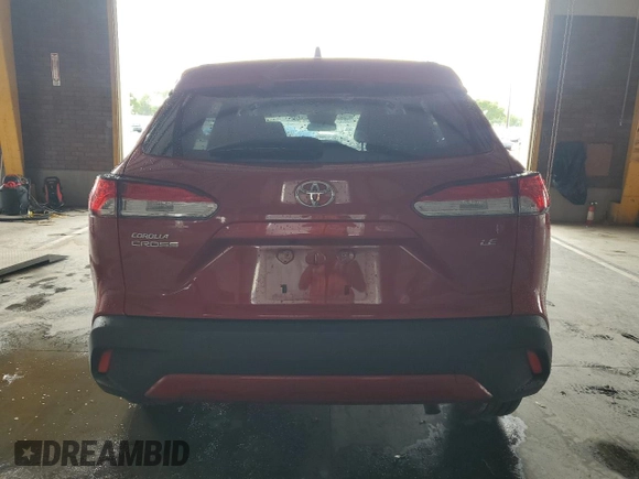 2023 Toyota Corolla Cross LE with VIN 7MUCAAAG6PV046568, listed as a Copart auction lot 56658195 with 30,482 mi miles and Non repairable. Bid and sale history available at DreamBid. Image 6.