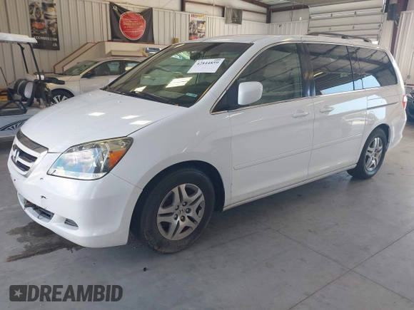 2005 Honda Odyssey EX with VIN 5FNRL38415B010150, listed as a IAAI auction lot 42844859 with 174,421 mi miles and . Bid and sale history available at DreamBid. Image 2.