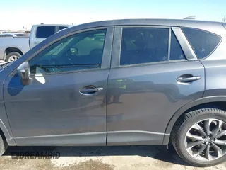 2016 Mazda CX-5 Grand Touring with VIN JM3KE2DYXG0784615, listed as a IAAI auction lot 41846853 with 72,185 mi miles. Bid and sale history available at carsss.com. Image 14.