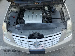 2007 Cadillac DTS V8 z VIN 1G6KD57Y77U125427, wystawiony jako Copart lot #82278094 z przebiegiem 117 812 mil mil oraz Czysty tytuł • Clean title. Historia ofert i sprzedaży dostępna na DreamBid. Obrazek 11.