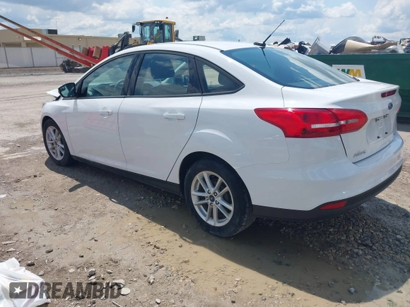 2016 Ford Focus SE z VIN 1FADP3F29GL346196, wystawiony jako IAAI lot #42171014 z przebiegiem 80 913 mil mil oraz . Historia ofert i sprzedaży dostępna na DreamBid. Obrazek 3.