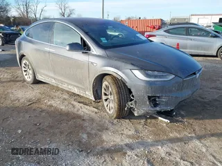 2017 Tesla Model X 90D with VIN 5YJXCDE23HF051321, listed as a IAAI auction lot 41415384 with 127,476 mi miles and . Bid and sale history available at carsss.com. Image 1.