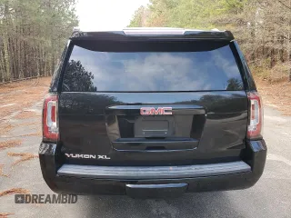 2017 GMC Yukon XL SLE with VIN 1GKS1FKC9HR221883, listed as a Copart auction lot 81000144 with 93,494 mi miles and Clean Title. Bid and sale history available at carsss.com. Image 6.
