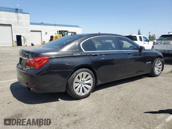 2011 BMW 7 Series with VIN WBAKX8C55BC198292, listed as a Copart auction lot 57907915 with 76,478 mi miles and Salvage title. Bid and sale history available at DreamBid. Image 3.