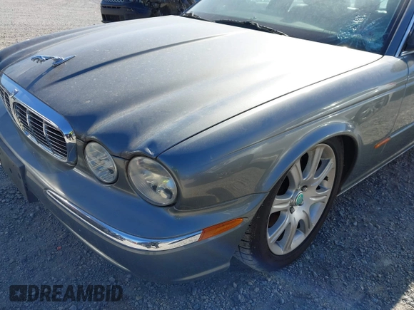 2005 Jaguar XJ with VIN SAJWA79C85SG48974, listed as a IAAI auction lot 41844684 with 154,145 mi miles. Bid and sale history available at carsss.com. Image 13.