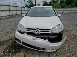 2007 Volkswagen Rabbit z VIN WVWCS71K67W272799, wystawiony jako Copart lot #57412165 z przebiegiem 183 683 mil mil oraz Szkoda całkowita • Salvage title. Historia ofert i sprzedaży dostępna na DreamBid. Obrazek 14.