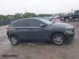 2023 Hyundai Kona SE with VIN KM8K22AB0PU982366, listed as a IAAI auction lot 41642860 with 53,008 mi miles. Bid and sale history available at carsss.com. Image 13.