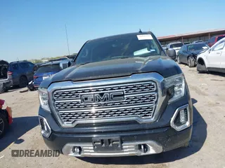 2020 GMC Sierra 1500 Denali with VIN 1GTU9FEL0LZ369793, listed as a IAAI auction lot 41870341 with 81,959 mi miles and . Bid and sale history available at DreamBid. Image 12.