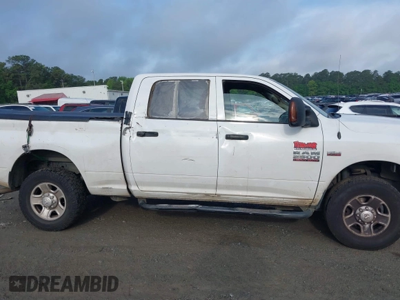 2015 Ram 2500 Tradesman with VIN 3C6TR5CT1FG628313, listed as a IAAI auction lot 42105431 with 306,368 mi miles and . Bid and sale history available at DreamBid. Image 13.
