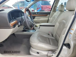 2001 Lincoln Continental z VIN 1LNHM97V91Y622267, wystawiony jako Copart lot #59915445 z przebiegiem 77 070 mil mil oraz Szkoda całkowita • Salvage title. Historia ofert i sprzedaży dostępna na DreamBid. Obrazek 7.