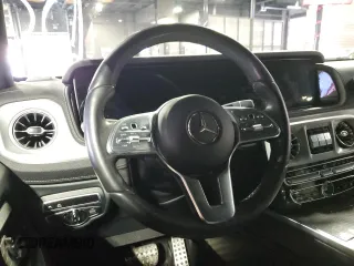 2021 Mercedes-Benz G 550 with VIN W1NYC6BJ1MX418396, listed as a Copart auction lot 83761414 with 25,151 mi miles and Salvage Title. Bid and sale history available at DreamBid. Image 5.