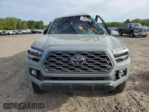 2023 Toyota Tacoma SR z VIN 3TMCZ5ANXPM622882, wystawiony jako Copart lot #53085845 z przebiegiem 11 207 mil mil oraz Szkoda całkowita • Salvage title. Historia ofert i sprzedaży dostępna na DreamBid. Obrazek 5.