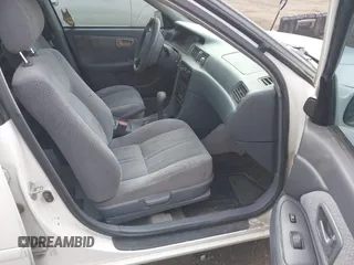 2000 Toyota Camry CE z VIN 4T1BG22KXYU948498, wystawiony jako IAAI lot #42247074 z przebiegiem 152 973 mil mil oraz . Historia ofert i sprzedaży dostępna na DreamBid. Obrazek 5.