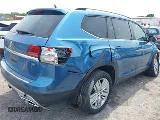2019 Volkswagen Atlas SE z VIN 1V2WR2CA5KC524650, wystawiony jako IAAI lot #42217791 z przebiegiem 92 571 mil mil oraz . Historia ofert i sprzedaży dostępna na DreamBid. Obrazek 4.