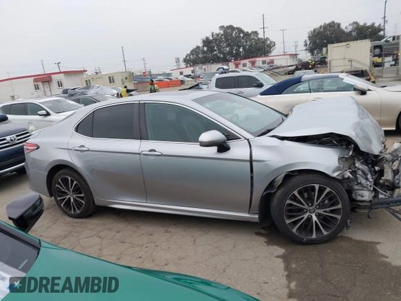 2019 Toyota Camry LE z VIN 4T1B11HK7KU713082, wystawiony jako IAAI lot #42151362 z przebiegiem 93 546 mil mil oraz . Historia ofert i sprzedaży dostępna na DreamBid. Obrazek 14.