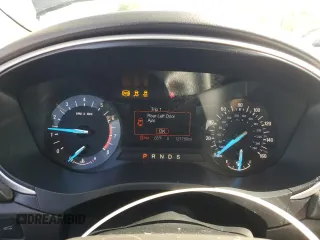 2015 Ford Fusion SE z VIN 1FA6P0HDXF5103053, wystawiony jako Copart lot #57763875 z przebiegiem 121 789 mil mil oraz Szkoda całkowita • Salvage title. Historia ofert i sprzedaży dostępna na DreamBid. Obrazek 9.