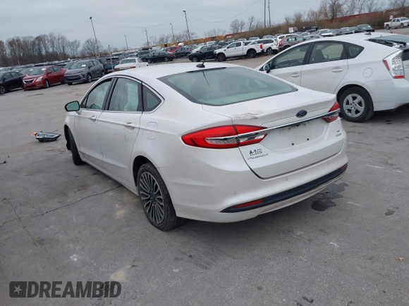 2017 Ford Fusion SE z VIN 3FA6P0HDXHR178108, wystawiony jako IAAI lot #41008773 z przebiegiem 96 598 mil mil oraz . Historia ofert i sprzedaży dostępna na DreamBid. Obrazek 3.