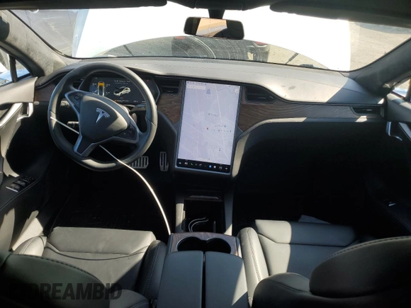 2019 Tesla Model S 100D with VIN 5YJSA1E41KF330631, listed as a Copart auction lot 55360295 with 52,245 mi miles and Salvage title. Bid and sale history available at DreamBid. Image 8.