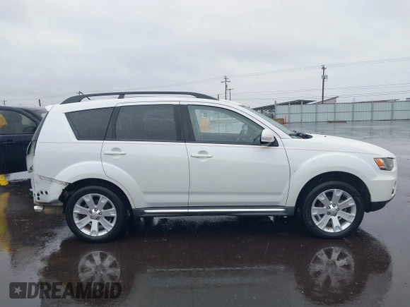 2011 Mitsubishi Outlander SE z VIN JA4AS3AW3BU019148, wystawiony jako IAAI lot #41851004 z przebiegiem 88 989 mil mil oraz . Historia ofert i sprzedaży dostępna na DreamBid. Obrazek 14.