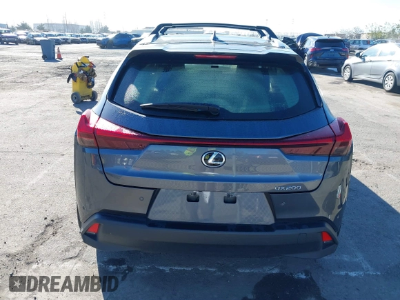 2022 Lexus UX with VIN JTHX3JBH6N2056436, listed as a IAAI auction lot 41856541 with 12,815 mi miles. Bid and sale history available at carsss.com. Image 16.