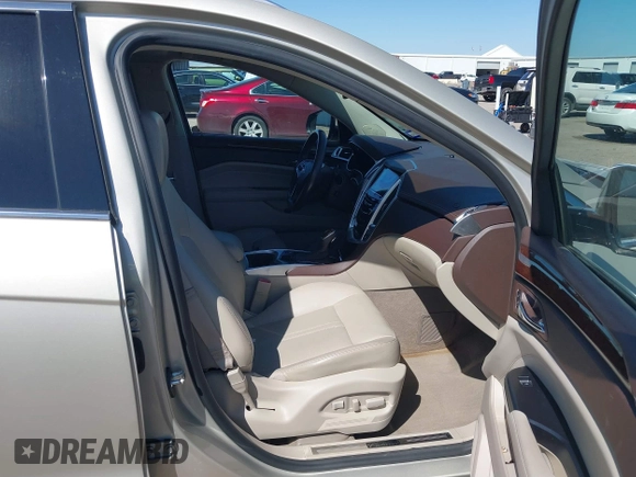 2015 Cadillac SRX Luxury Collection z VIN 3GYFNBE38FS641807, wystawiony jako IAAI lot #41669512 z przebiegiem 147 889 mil mil oraz . Historia ofert i sprzedaży dostępna na DreamBid. Obrazek 5.