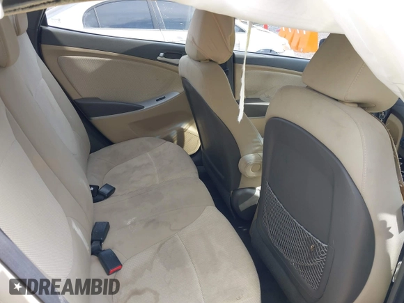 2014 Hyundai Accent GLS z VIN KMHCT4AE5EU697201, wystawiony jako IAAI lot #42157098 z przebiegiem 139 181 mil mil oraz . Historia ofert i sprzedaży dostępna na DreamBid. Obrazek 8.