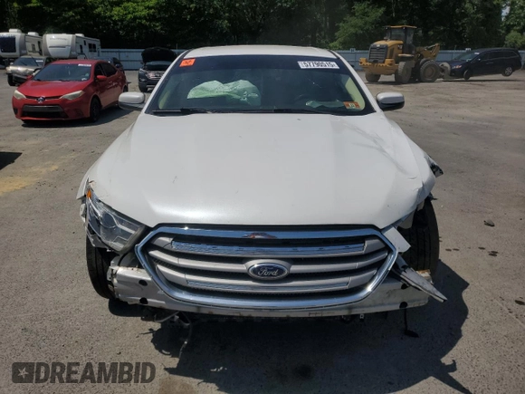 2015 Ford Taurus SEL z VIN 1FAHP2E82FG108442, wystawiony jako Copart lot #57790515 z przebiegiem 116 834 mil mil oraz Szkoda całkowita • Salvage title. Historia ofert i sprzedaży dostępna na DreamBid. Obrazek 5.