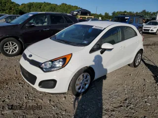 2014 Kia Rio EX with VIN KNADN5A37E6410739, listed as a Copart auction lot 70122594 with 60,177 mi miles and Salvage Title. Bid and sale history available at carsss.com. Image 1.
