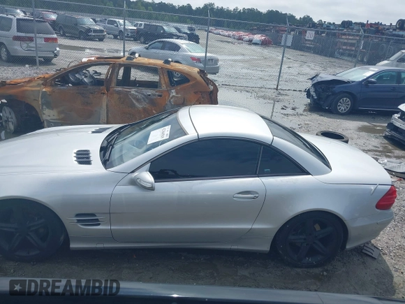 2004 Mercedes-Benz SL 500 z VIN WDBSK75F94F077444, wystawiony jako IAAI lot #42366519 z przebiegiem 181 413 mil mil oraz . Historia ofert i sprzedaży dostępna na DreamBid. Obrazek 14.
