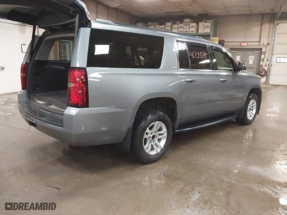 2019 Chevrolet Suburban LT with VIN 1GNSKHKC3KR195042, listed as a IAAI auction lot 41704591 with 107,166 mi miles. Bid and sale history available at carsss.com. Image 4.