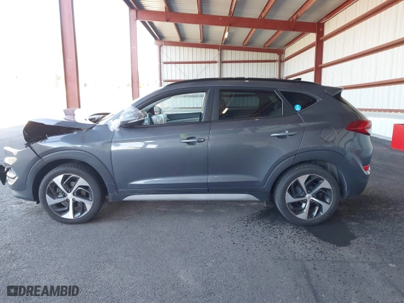 2018 Hyundai Tucson Value with VIN KM8J3CA20JU762120, listed as a IAAI auction lot 41878796 with 103,346 mi miles. Bid and sale history available at carsss.com. Image 14.