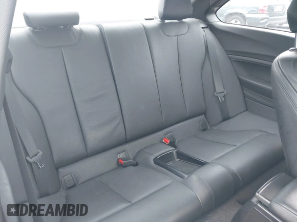 2016 BMW 2 Series 228i with VIN WBA1F9C50GV544975, listed as a IAAI auction lot 42426019 with 82,719 mi miles and . Bid and sale history available at DreamBid. Image 8.