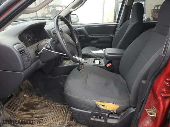 2003 Jeep Grand Cherokee Laredo with VIN 1J4GW48SX3C531892, listed as a Copart auction lot 43029375 with 246,444 mi miles and Salvage Title. Bid and sale history available at carsss.com. Image 7.