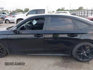 2022 Honda Civic Sport z VIN 2HGFE2F56NH583737, wystawiony jako IAAI lot #42063718 z przebiegiem 42 952 mil mil oraz . Historia ofert i sprzedaży dostępna na DreamBid. Obrazek 14.